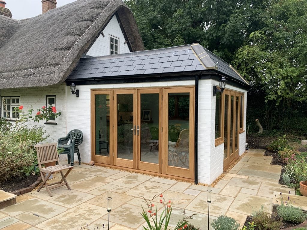 White brick Thatched cottage with orangery extension, KL and Sons Building Services, Devizes, Marlborough, Calne, Bath